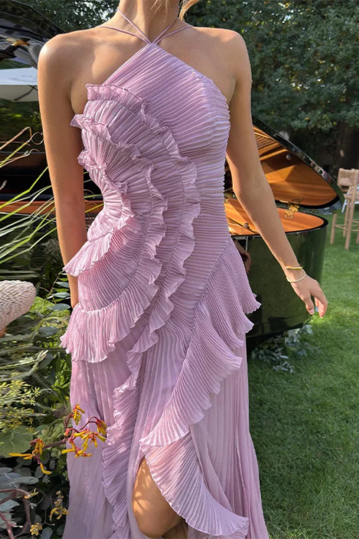 Ruffled and pleated women's backless halter maxi dress, a chic and elegant choice for summer occasions.