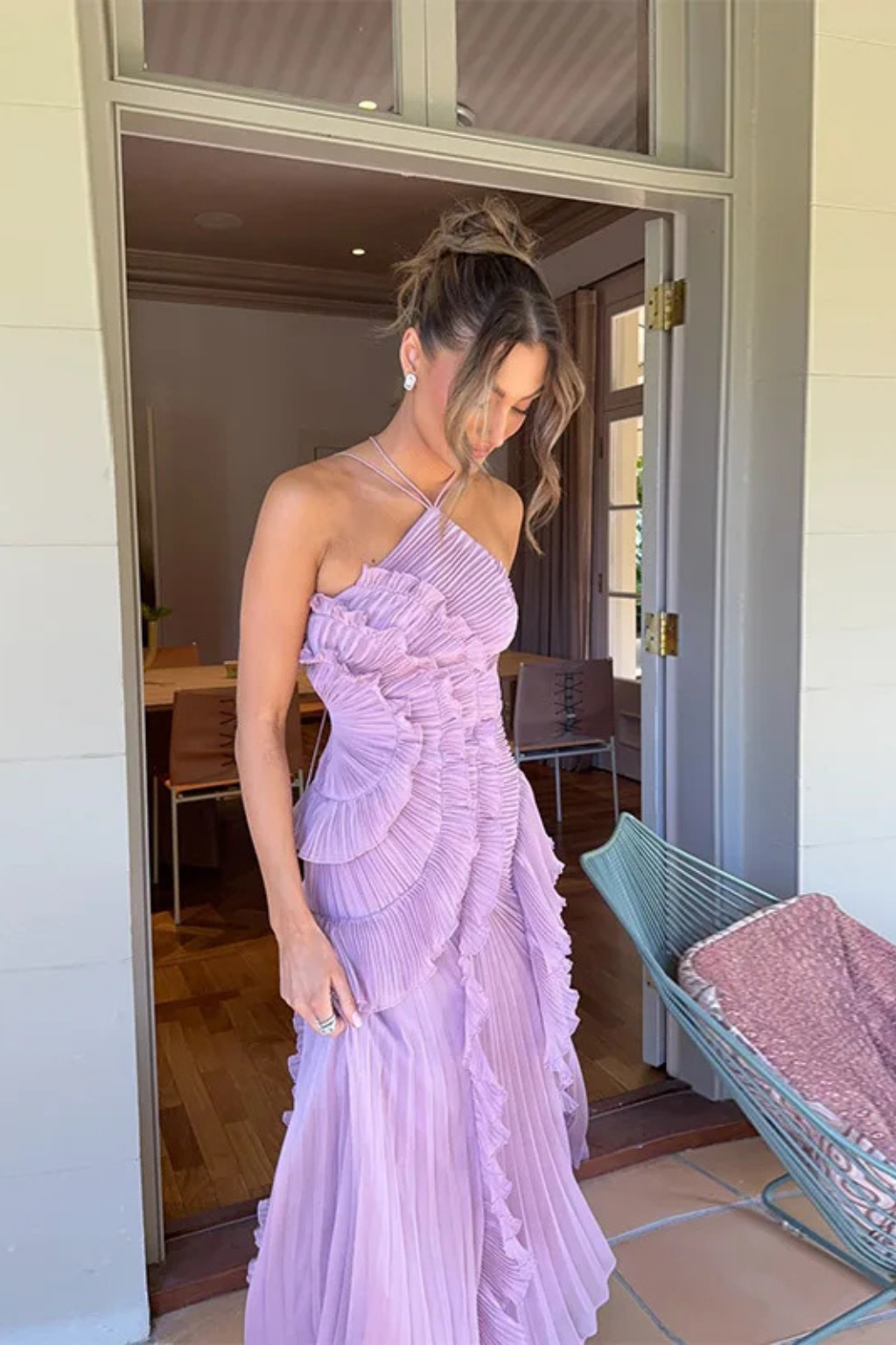 Graceful women's backless halter sleeveless maxi dress with delicate ruffles, ideal for summer parties.