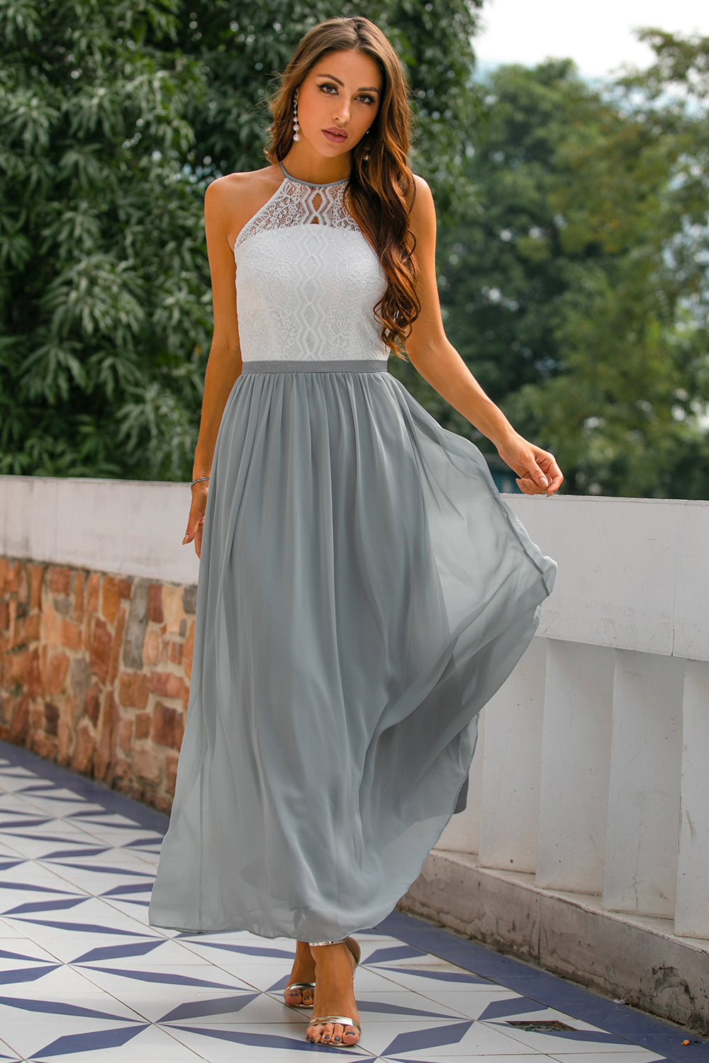Elegant women's halter maxi dress, perfect for wedding guests, in a soft, flowing fabric.