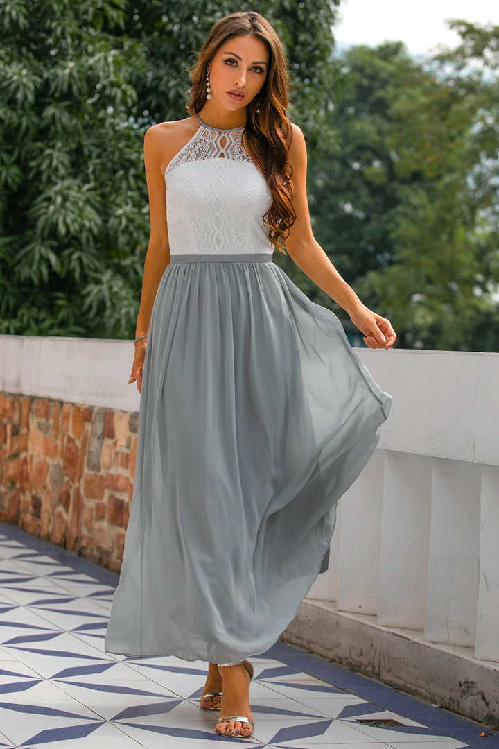 Elegant women's halter maxi dress, perfect for wedding guests, in a soft, flowing fabric.