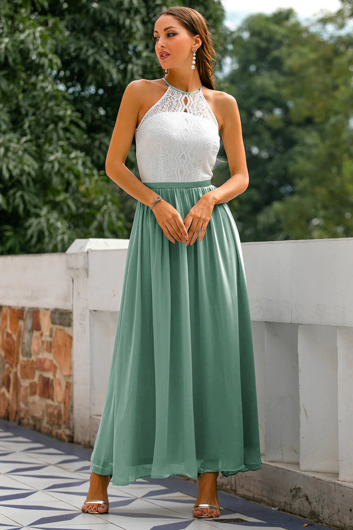 Luxurious fabric of a women's formal halter maxi dress, detailed texture shot.