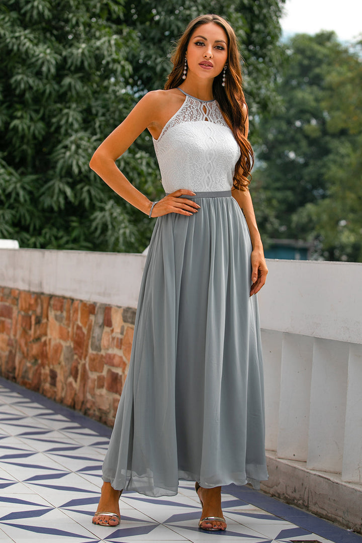 Chic halter maxi dress, showcasing elegant draping and a refined silhouette for guests.
