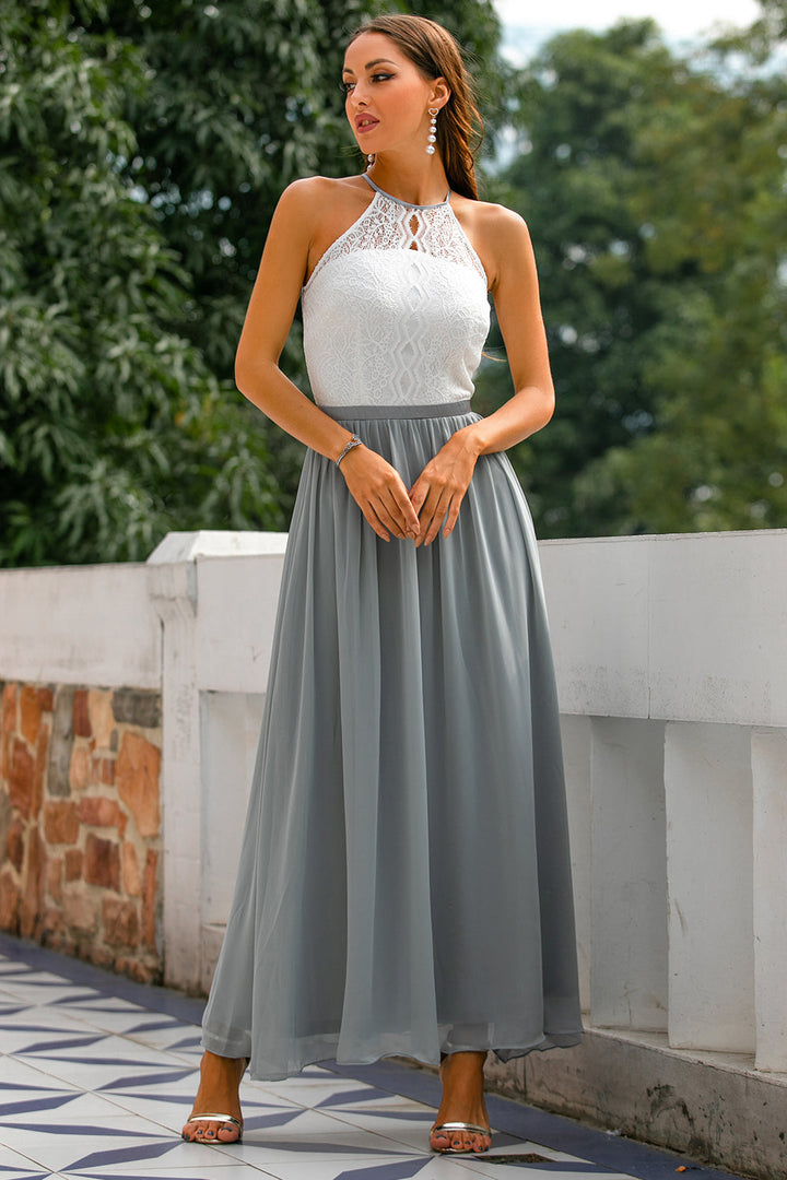 Wedding guest attire: a beautiful women's halter maxi dress in a delicate color.