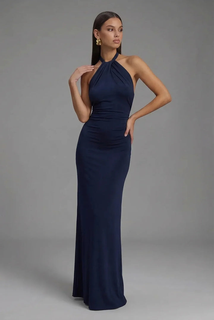 Graceful women's backless halter maxi dress with ruched details. An elegant, comfortable sleeveless gown for special events.