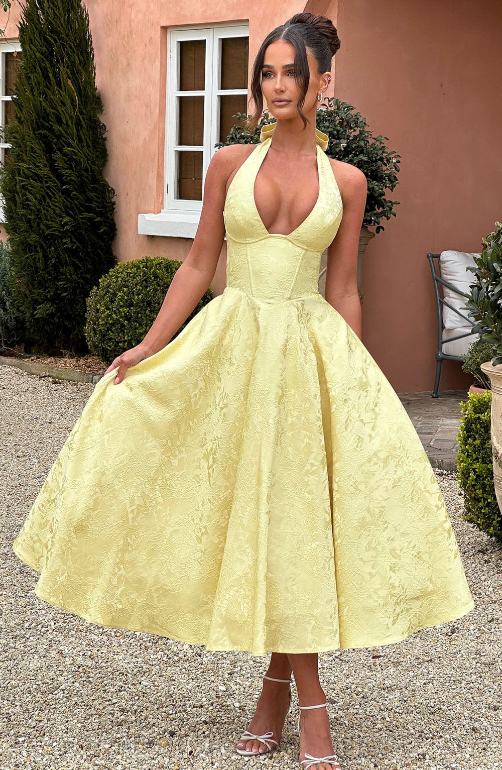 Classic elegant halter neck midi dress, a timeless addition to any women's wardrobe.