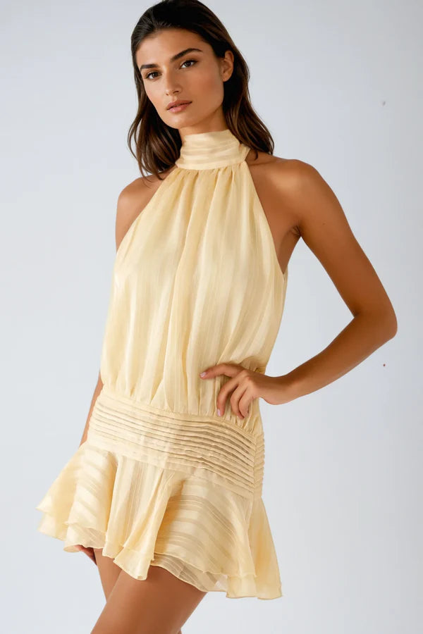 Purple halter neck mini dress with romantic ruffles, an elegant cocktail option