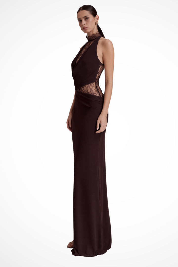 Feminine red-brown halter neck maxi dress, a sleeveless elegant choice for women attending weddings or evening events.