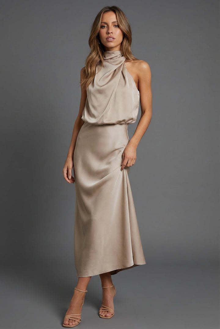 Elegant women's halterneck midi dress for wedding guests. Perfect for formal and special occasions.