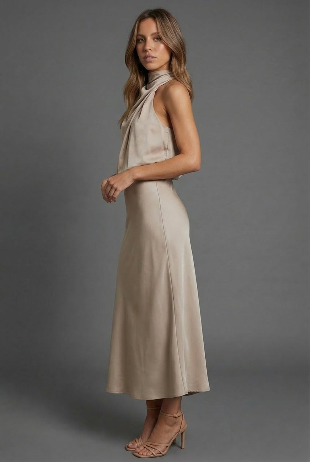 Stylish halterneck open back midi dress for women, ideal for cocktail parties & summer evening wear.