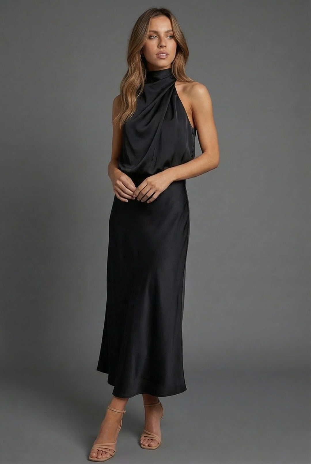 Chic women's elegant midi dress with halterneck, suitable for formal events & evening wear.