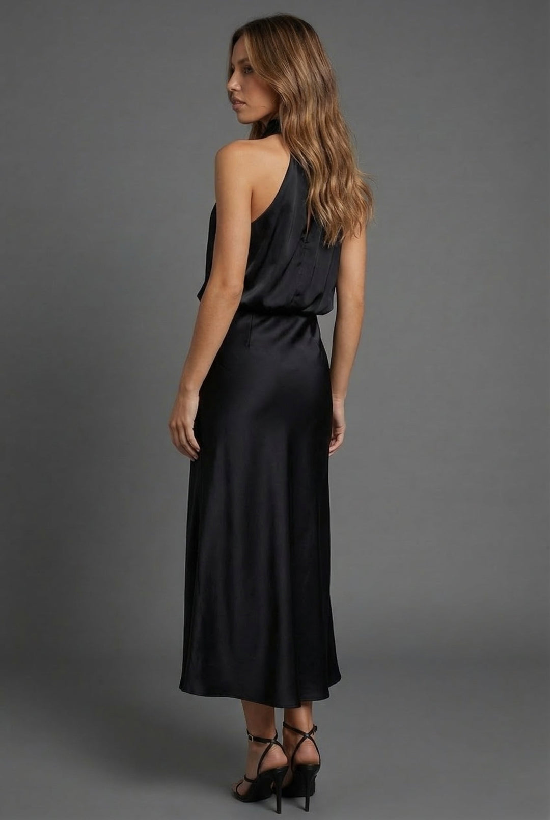 Sleek women's halterneck midi dress, an elegant choice for wedding guests & cocktail parties.