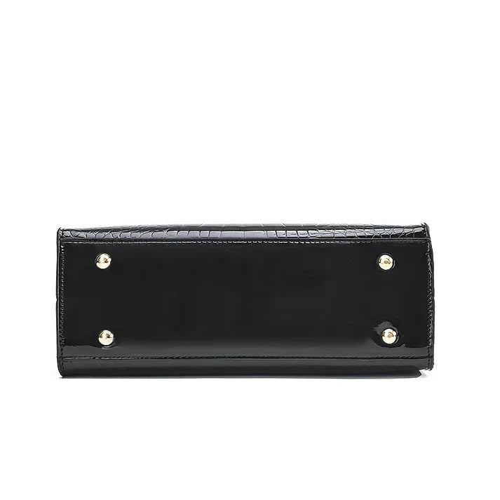 Stylish glossy women's purse, an elegant fashion tote. Great for office, parties, or sophisticated daily carry.