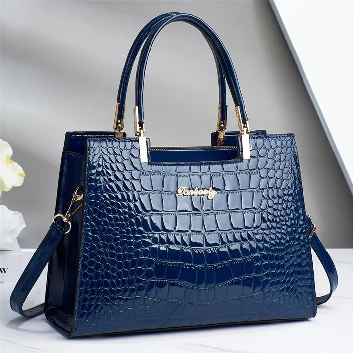Glossy women's elegant handbag. Structured fashion tote, perfect for daily carry, office, or formal events.