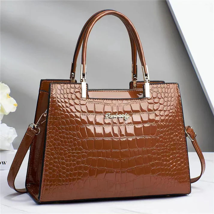 Elegant women's formal handbag, evening clutch style. Stylish glossy finish adds sophistication to any look.
