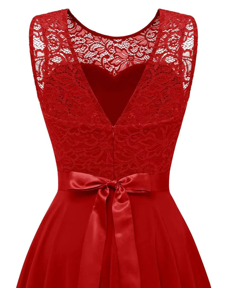 Detail of the waistline and high low skirt on a women's elegant formal dress, versatile for events