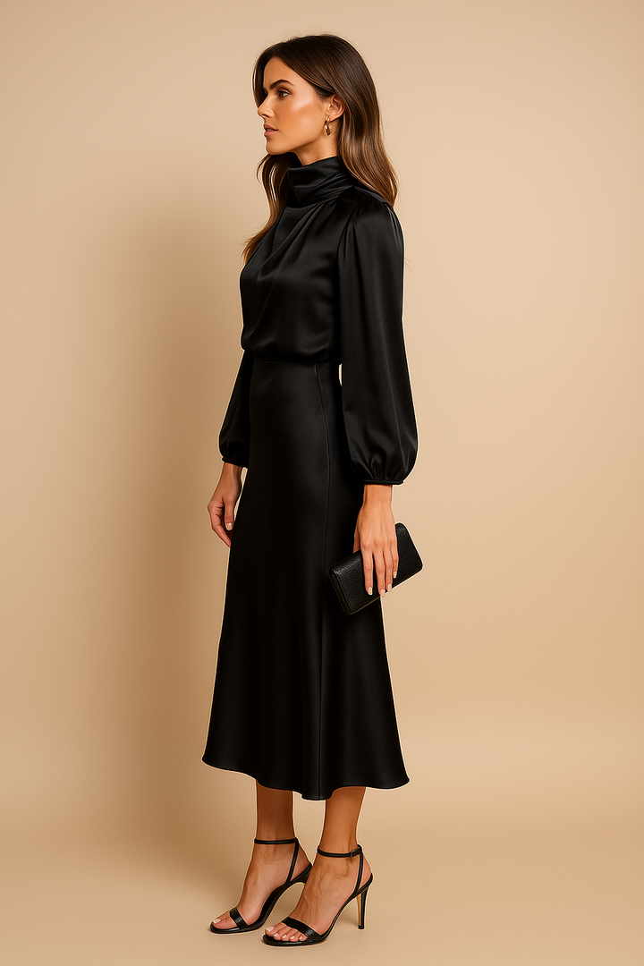 Detail of the high waist on the apricot midi dress, a flattering casual women's garment.