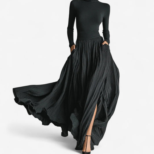Elegant women's high waist pleated maxi skirt and long sleeve top set in flowy fabric.