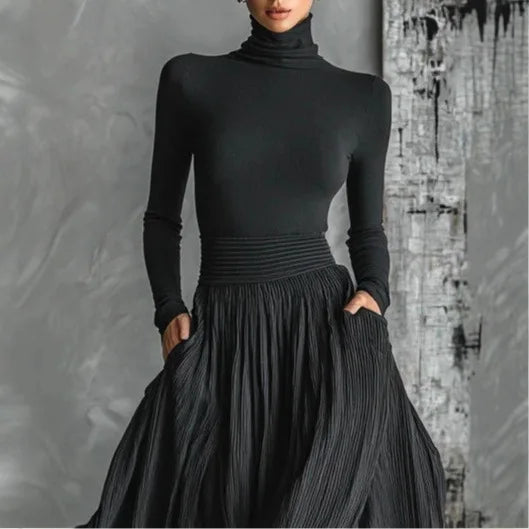 Elegant women's two-piece set featuring a high waist maxi skirt and a matching long sleeve shirt.