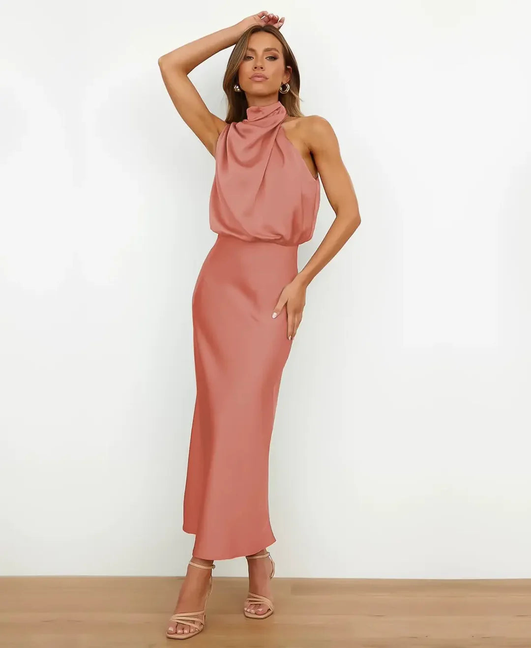 Elegant women's sleeveless midi party dress, forest green, with a comfortable high waist