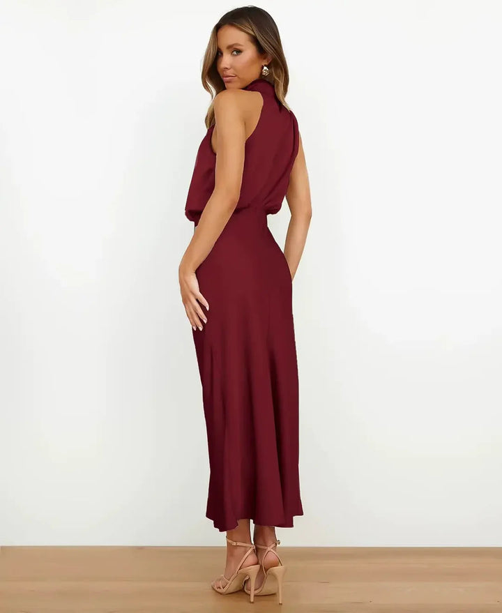 Front view of a white high neck sleeveless midi dress, ideal for women's party fashion