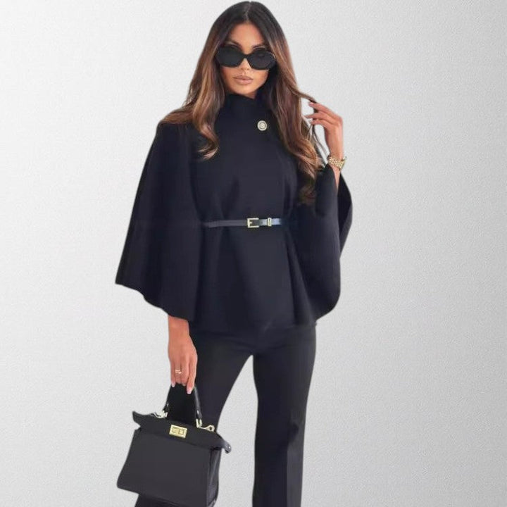 Sophisticated ladies blazer featuring unique butterfly sleeves and a stylish waist belt