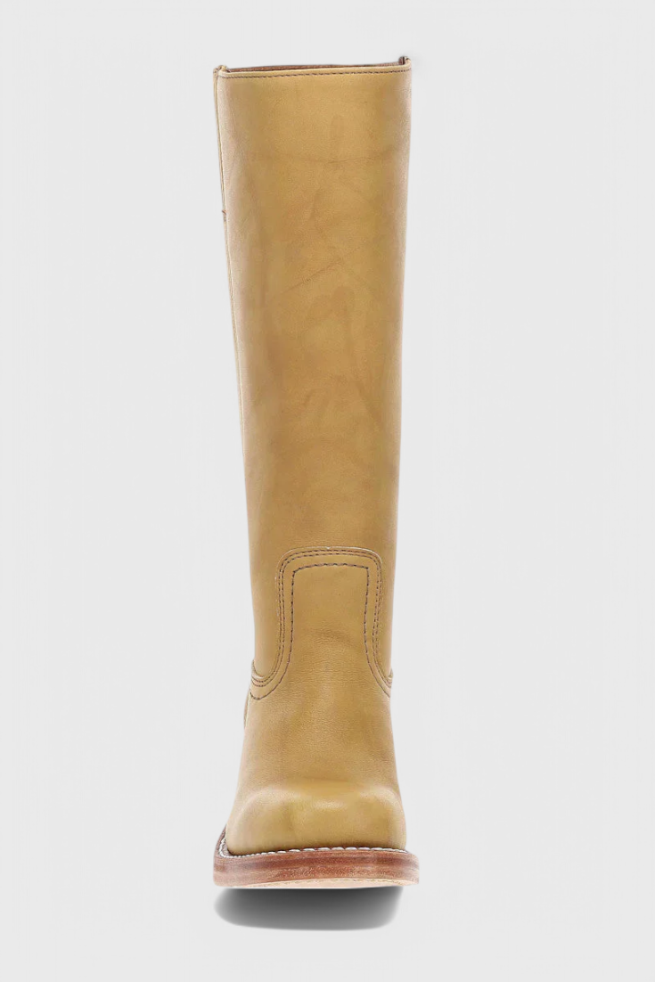Luxurious brown knee-high boots for women, offering supreme comfort & an elegant stacked heel.