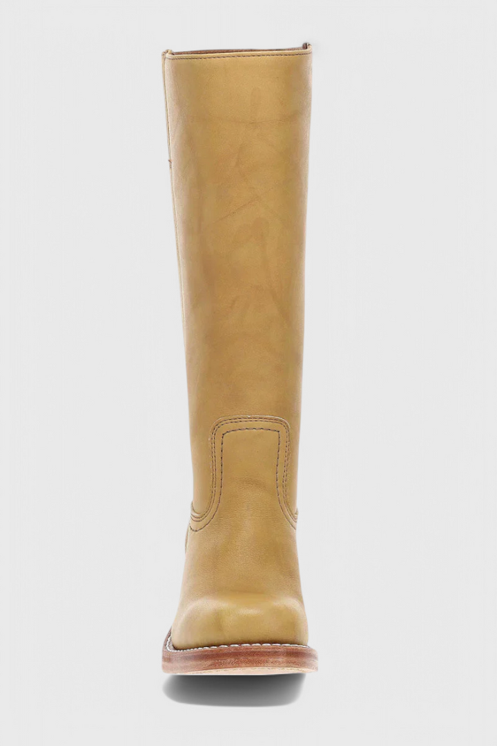 Luxurious brown knee-high boots for women, offering supreme comfort & an elegant stacked heel.