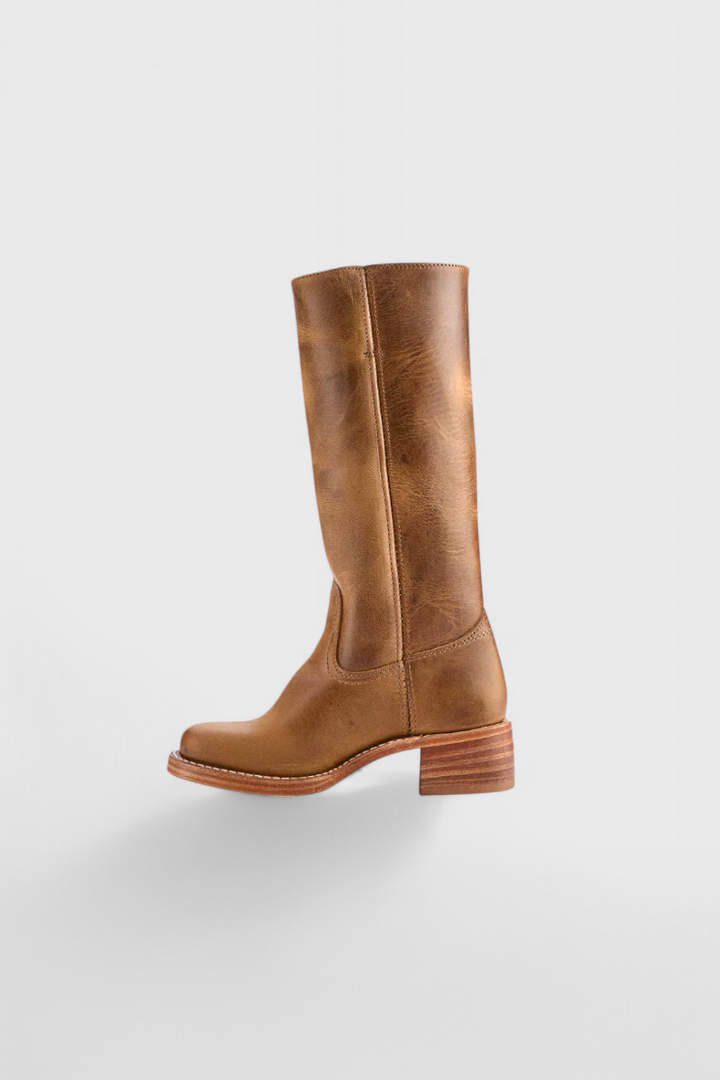 Fashion-forward brown knee-high boots for women, featuring an elegant stacked heel for fall/winter.