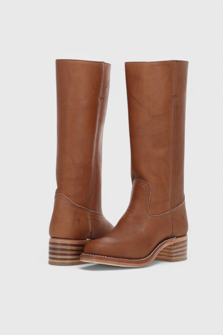 Stylish brown knee-high boots with sturdy stacked heel, offering comfort and elegance for any outfit.