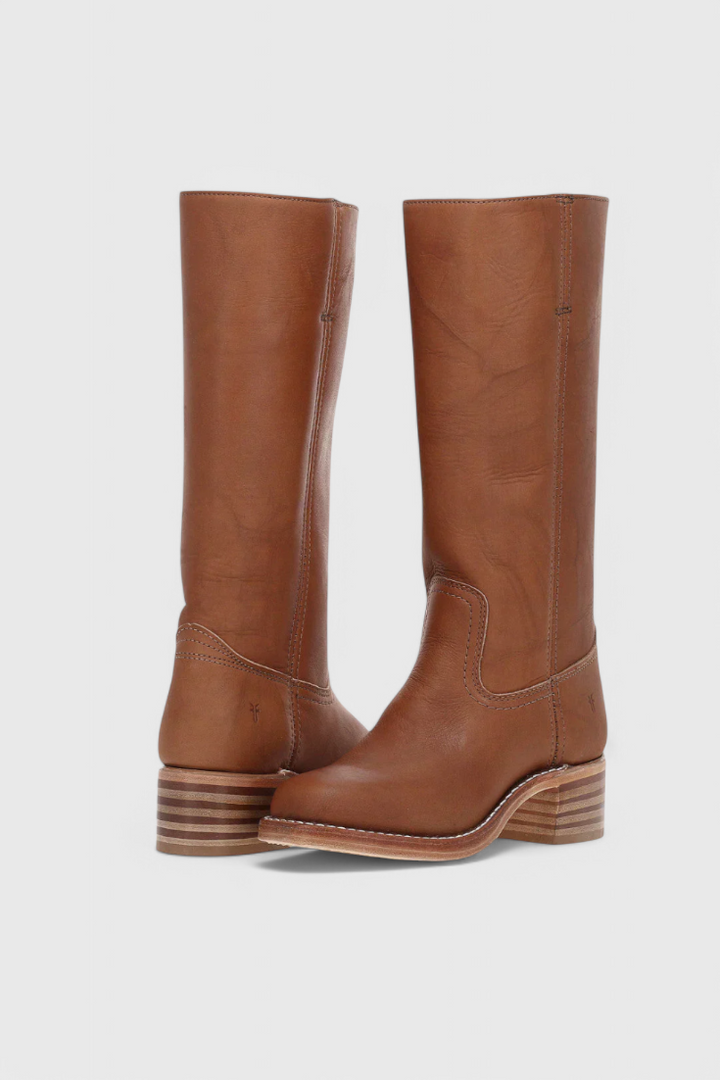 Stylish brown knee-high boots with sturdy stacked heel, offering comfort and elegance for any outfit.