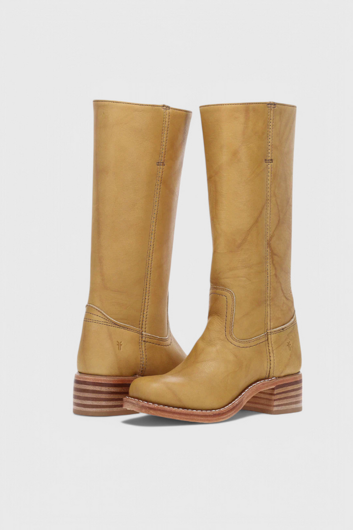 Comfortable women's elegant knee-high boots with fashionable stacked heel for versatile wear.