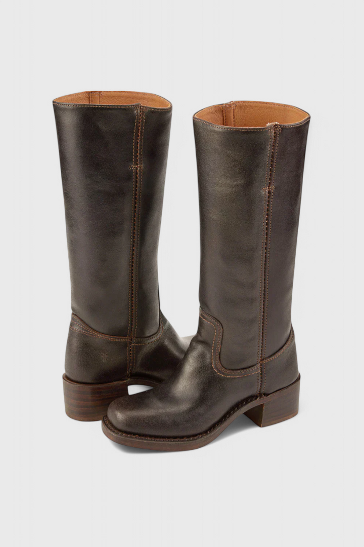 Versatile black leather knee-high boots for women, designed with an elegant look & stacked heel.