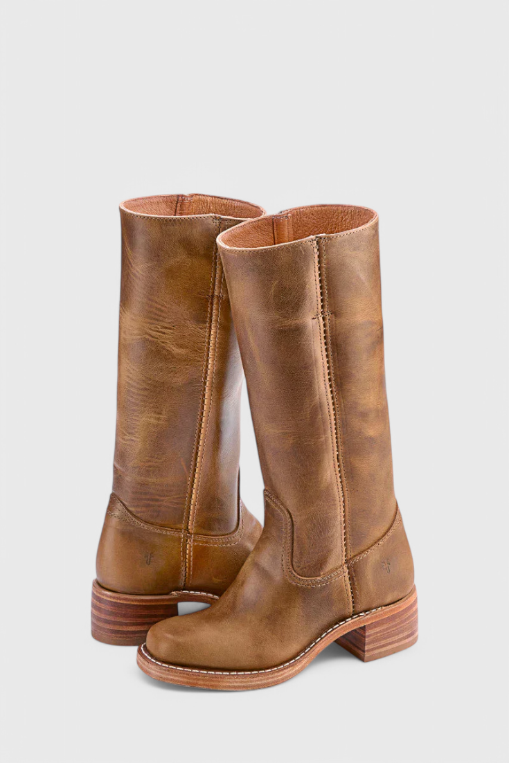 Fall fashion brown knee-high boots, offering women elegance & comfort with a stylish stacked heel.