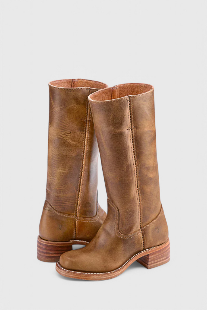 Fall fashion brown knee-high boots, offering women elegance & comfort with a stylish stacked heel.