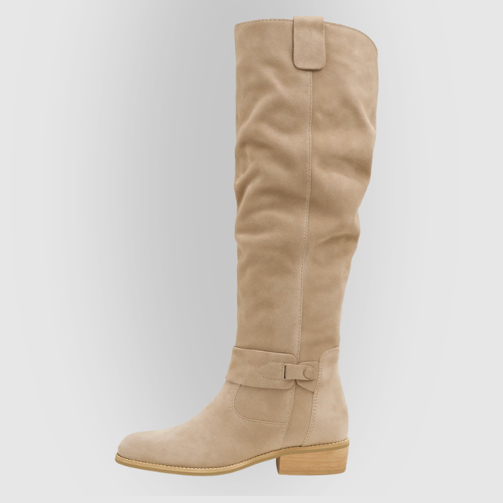 Elegant women's knee-high suede boots in classic black, perfect for fall fashion and winter outfits