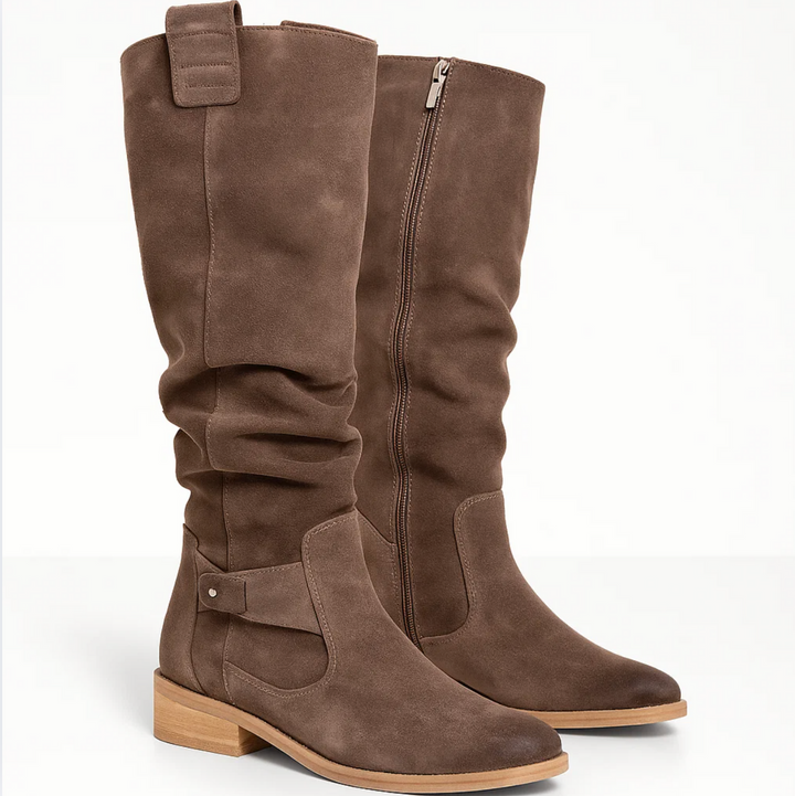 Fashionable knee-high suede boots for women, featuring a luxurious texture and elegant silhouette