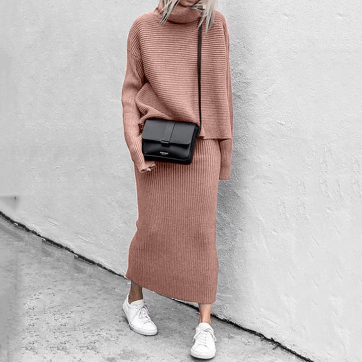 Elegant women's knit sweater and skirt set in cozy fabric, perfect for fall and winter fashion.