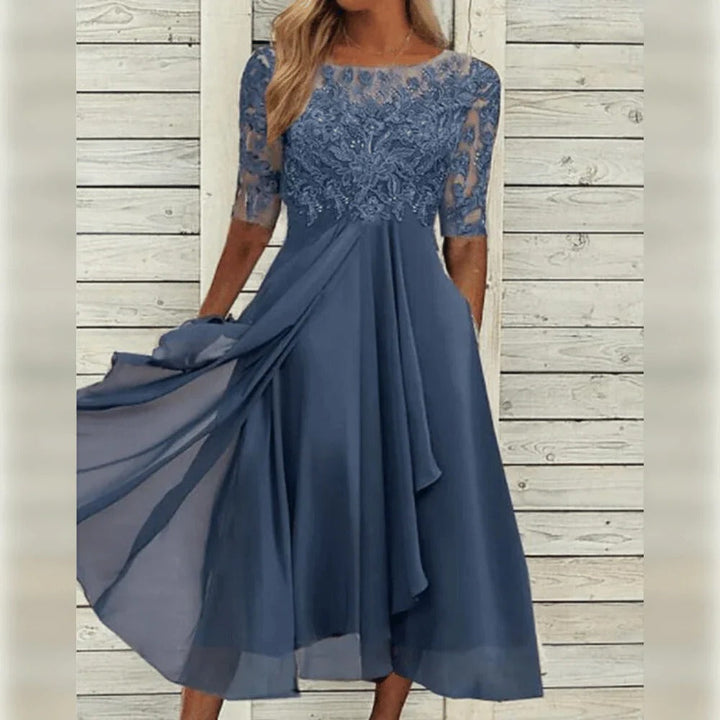 Timeless & sophisticated women's lace midi dress with a flowing skirt, ideal for elegant evening events.