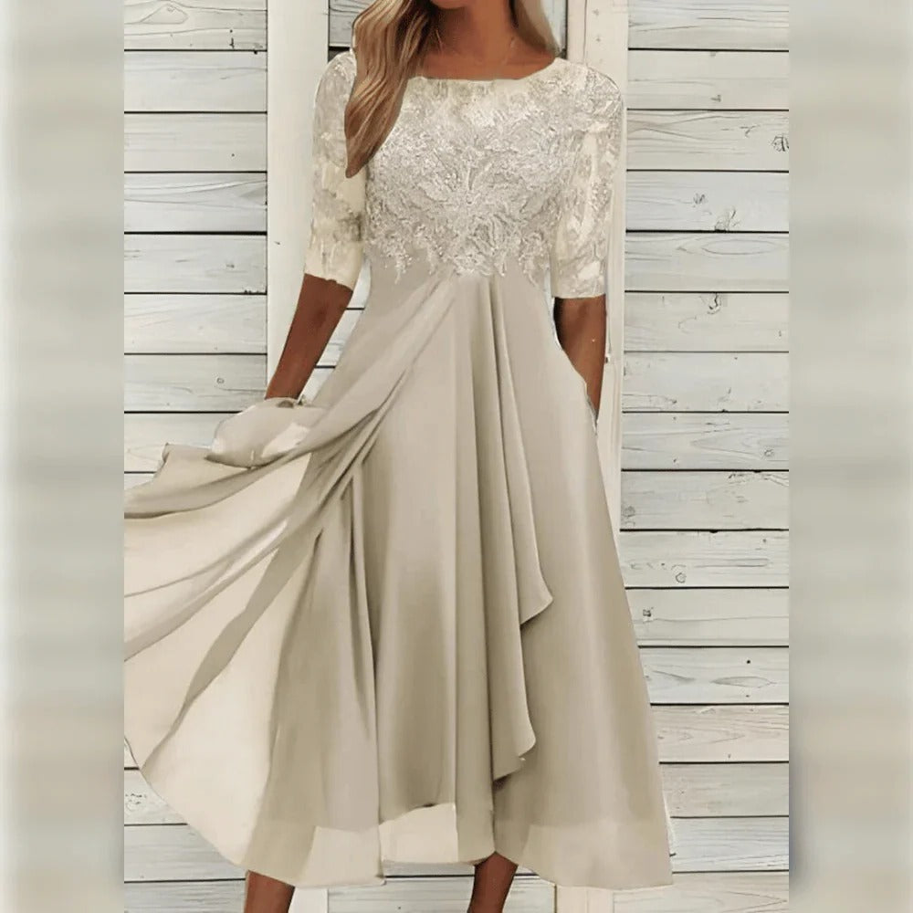 Fashionable women's elegant lace midi dress for sophisticated style at any special occasion or formal event.