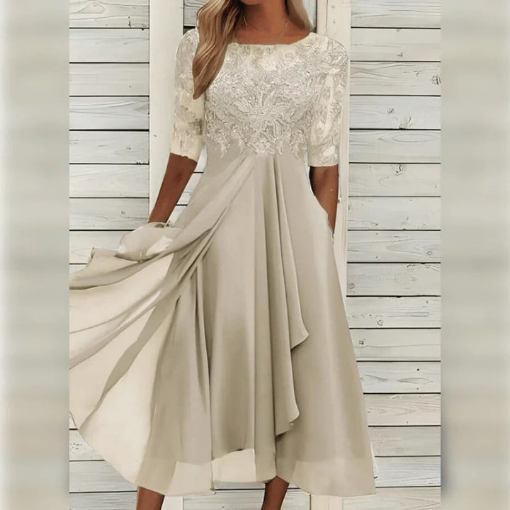 Fashionable women's elegant lace midi dress for sophisticated style at any special occasion or formal event.