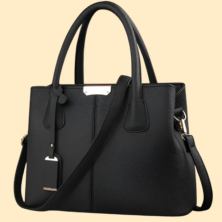 Fashionable women's leather shoulder bag with a sleek design, suitable for any occasion.