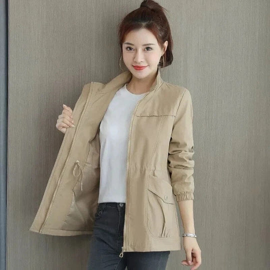 Stylish women's black waterproof trench coat, a sophisticated and practical fall jacket for ladies