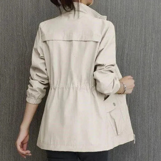 Women's lightweight trench coat, waterproof and fashionable in a neutral color for everyday wear