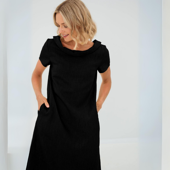 Versatile women's linen summer dress. Short sleeve, pockets, and a cool, elegant look for warm weather.