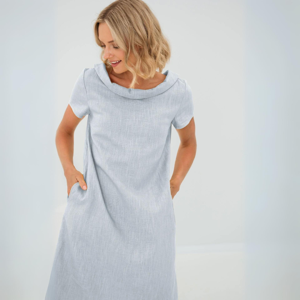 Women's elegant linen summer dress. Casual, breezy, and cool short sleeve style for versatile fashion.