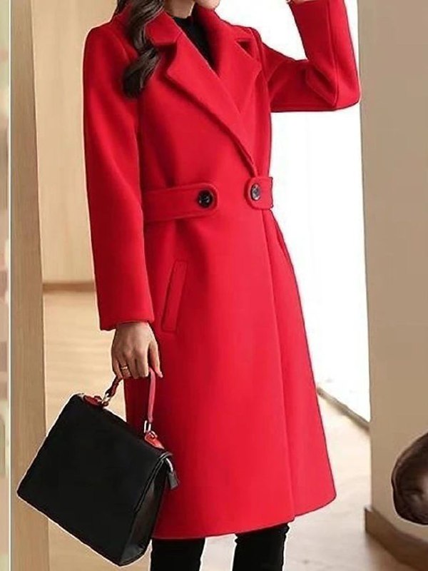 Chic women's formal long trench coat, showcasing a tailored fit and classic design for elegant outerwear.