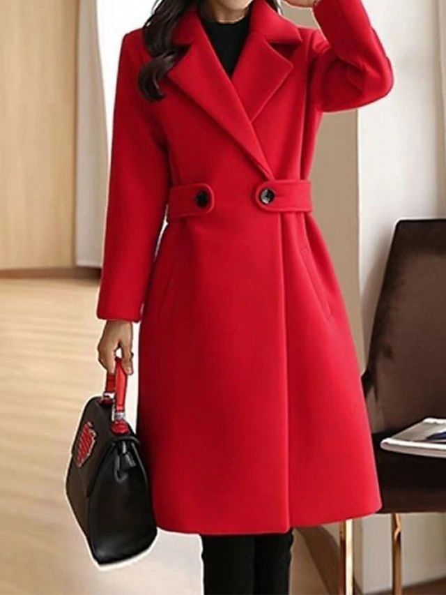 Sophisticated women's long trench coat, an essential elegant outerwear for any formal workwear ensemble.