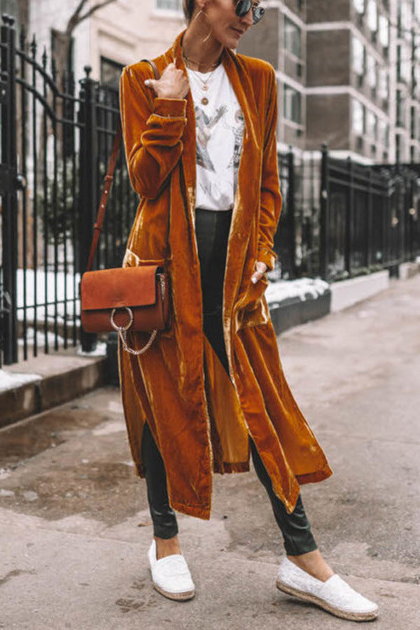 Fashionable women's long open-front coat, an elegant and versatile statement for ladies' style.