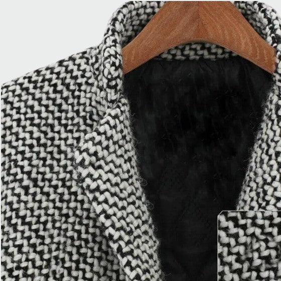 Women's sophisticated long overcoat, perfect for elegant outerwear and classic winter fashion.