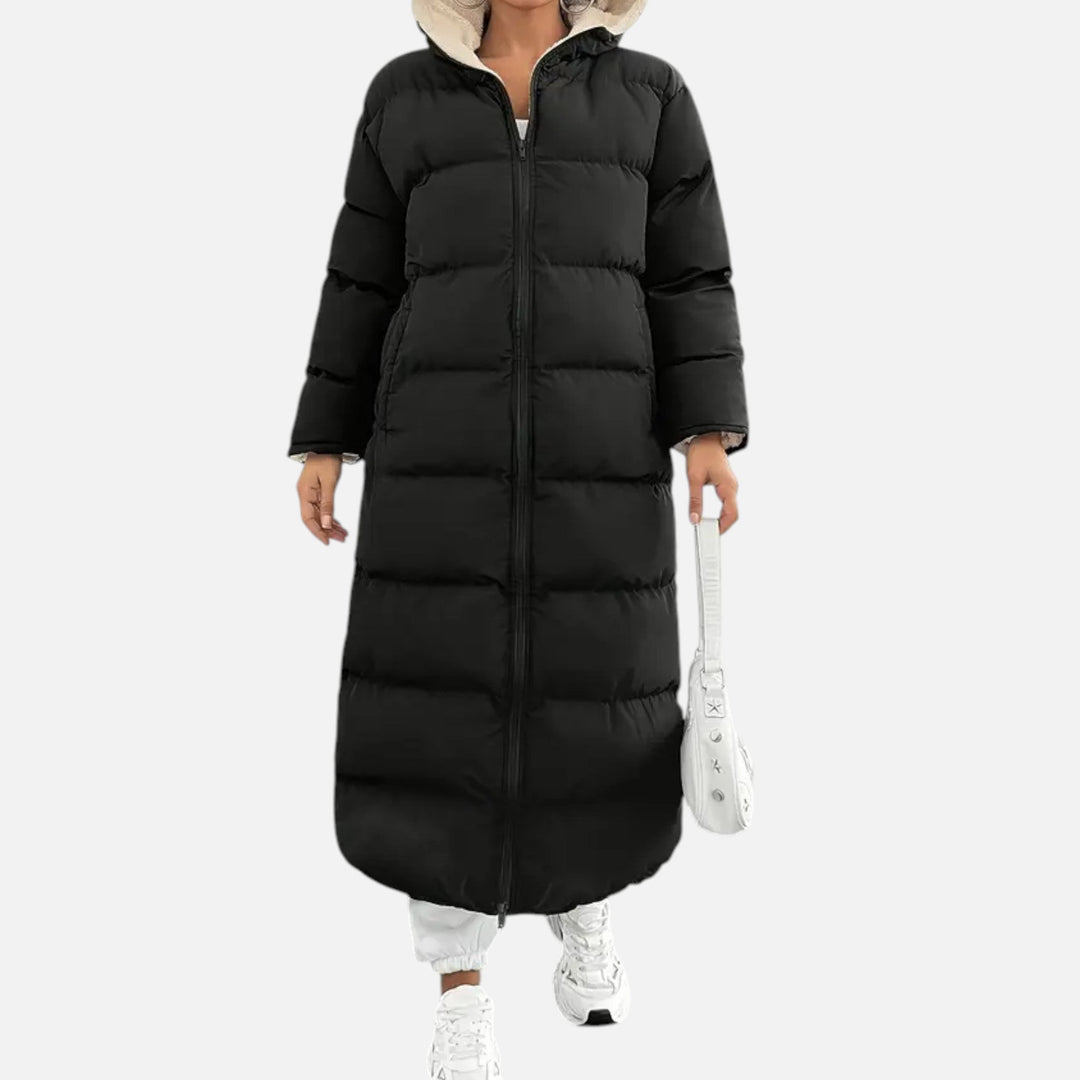 Elegant women's long puffer coat, hooded & warm for stylish winter outerwear. Perfect for cold weather.